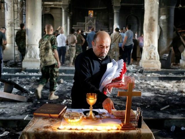 Iraqi-Christian-Mosul-reuters-640x480.jpg