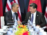 Obama and Chinese President Shake AP