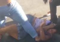 Parking space brawl (Screen shot / Grindface_tv)