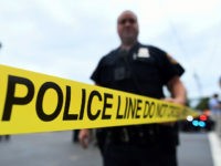 Law enforcement officers secure the area where they allegedly arrested terror suspect Ahmad Khan Rahami following a shootout in Linden, New Jersey, on September 19, 2016.16 An 'armed and dangerous' Afghan-born suspect wanted in the weekend bomb attacks in New York and New Jersey was wounded Monday in a shootout with police and taken into custody. Federal investigators released a mugshot of 28-year-old Ahmad Khan Rahami, who has brown hair, brown eyes and a brown beard, saying he was last known to live in Elizabeth, a town adjacent to Newark International Airport. / AFP / Jewel SAMAD (Photo credit should read JEWEL SAMAD/AFP/Getty Images)