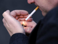 Smokers put off quitting for fear of gaining weight. PICTURE POSED BY MODEL File photo dated 12/03/13 of a man lighting a cigarette. Half of smokers delay quitting for years because they worry about getting fat, a survey has suggested. Issue date: Friday October 14, 2016. Fears over weight put kicking the habit on hold for seven and a half years on average, according to a Censuswide poll for Slimming World. See PA story HEALTH Smoking. Photo credit should read: Jonathan Brady/PA Wire URN:28910595 (Press Association via AP Images)