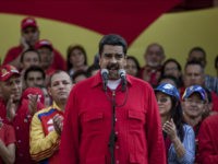 Venezuela's President Nicolas Maduro speaks during a political rally against the Congress in Caracas, Venezuela, Tuesday, Oct. 25, 2016. After the government suspended a recall referendum seeking Maduro's removal last week, the opposition-controlled congress began debating his "constitutional situation." Lawmakers vow to present evidence that Maduro a dual Colombian citizen and therefore constitutionally ineligible to hold Venezuela's highest office. (AP Photo/Alejandro Cegarra)