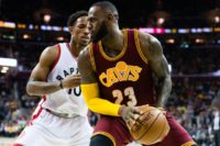LeBron James of the Cleveland Cavaliers fights for position with Toronto's DeMar DeRozan on November 15, 2016