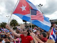 Cuban Americans in Miami react to the death of Fidel Castro on November 26, 2016, the day before US President-elect Donald Trump's advisers said his administration would strike a "better deal" for for Cuba than current President Barack Obama