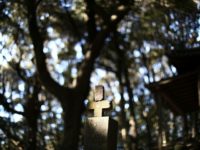 This photo taken on November 24, 2016 shows the grave of a Japanese 'hidden Christian' at Karematsu forest, where believers used to hold religious ceremonies in the city of Nagasaki.
Every so often, a group in the town of Ikitsuki, near Nagasaki, meet at a local museum to recite prayers drawn from another time and place. The group, dressed in sober kimonos and sandals, rapidly make the sign of the cross as they sing a mish-mash of Portuguese, Latin and Japanese -- evoking the memory of their ancestors, the so-called 'hidden Christians', who were brutally persecuted in the 17th century, when Shoguns ruled Japan.
 / AFP / Behrouz MEHRI / TO GO WITH Japan religion history film,FEATURE BY Ursula HYZY        (Photo credit should read BEHROUZ MEHRI/AFP/Getty Images)