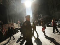 NEW YORK, NY - NOVEMBER 08: Police stand guard near Trump Tower on Election Day on November 8, 2016 in New York City. Throughout the country, millions of Americans are casting their votes today between Hillary Clinton and Donald Trump for the 45th president of the United States. (Photo by Spencer Platt/Getty Images)