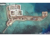 A satellite image shows what CSIS Asia Maritime Transparency Initiative says appears to be anti-aircraft guns and what are likely to be close-in weapons systems (CIWS) on the artificial island Hughes Reef in the South China Sea in this image released on December 13, 2016. Courtesy CSIS Asia Maritime Transparency Initiative/DigitalGlobe/Handout via REUTERS