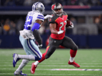 Doug Martin of the Tampa Bay Buccaneers carries the ball during the first half against the Dallas Cowboys at AT&T Stadium on December 18, 2016