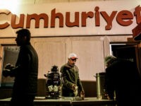 Protesters take the tea during a demonstration in support to the Turkish daily newspaper 'Cumhuriyet' outside its headquarters in Istanbul on November 1, 2016. Turkish police on October 31, 2016, detained the editor-in-chief of the newspaper Cumhuriyet -- a thorn in the side of President Recep Tayyip Erdogan -- as Ankara widens a crackdown on opposition media. The Cumhuriyet, which had published revelations embarrassing for the government, said at least a dozen journalists and executives were detained in early morning raids. Murat Sabuncu was detained while authorities searched for executive board chairman Akin Atalay and writer Guray Oz, the official news agency Anadolu said. / AFP / YASIN AKGUL (Photo credit should read YASIN AKGUL/AFP/Getty Images)