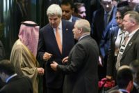 US Secretary of State John Kerry (C) speaks to Saudi Arabia's Foreign Minister Adel al-Jubeir (L) and Jordan's FM Nasser Judeh at the end of Syria peace talks in Lausanne, in October 2016