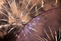 In London, over 100,000 people lined the banks of the River Thames to watch a spectacular fireworks display set to a soundtrack featuring Bowie and Prince 