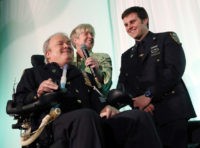 FILE - In this March 15, 2015 file photo, New York City Detective Steven McDonald, his wife Patti, and son, Conor, smile after receiving the Spirit of Giving Award at the Kelly Cares Foundation's 5th Annual Irish Eyes Gala held at the JW Marriot Essex House in New York. McDonald, who was paralyzed by a bullet and became an international voice for peace after he publicly forgave the gunman, died Tuesday, Jan. 10, 2017 at the age of 59. (Photo by Stuart Ramson/Invision for Kelly Cares Foundation/AP Images, File)
