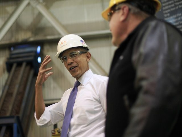 President Barack Obama gestures about wearing a hardhat and safety goggles during his tour at ArcelorMittal, a steel mill in Cleveland, Thursday, Nov. 14, 2013. Obama visited the steel mill to discuss the economy and manufacturing. From Ohio the president will travel to Philadelphia to raise campaign money benefiting the Democratic Senatorial Campaign Committee (DSCC). (AP Photo/Pablo Martinez Monsivais)