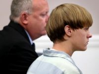 CHARLESTON, SC - JULY 16:  Dylan Roof (C), the suspect in the mass shooting that left nine dead in a Charleston church last month, appears in court July 18, 2015 in Charleston, South Carolina. The Associated Press, WCIV-TV and The Post and Courier of Charleston are challenging a judge's order issued last week that prohibits the release of public records in the June 17 shooting at Emanuel African Methodist Episcopal church.  (Photo by Grace Beahm-Pool/Getty Images)