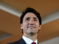 Canada's Prime Minister Justin Trudeau listens to a question from a journalist during an event at a restaurant in Gatineau, Quebec, Canada, July 20, 2016. REUTERS/Chris Wattie