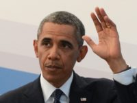 US President Barack Obama gestures during a press conference in Saint Petersburg on September 6, 2013 on the sideline of the G20 summit. World leaders at the G20 summit on Friday failed to bridge their bitter divisions over US plans for military action against the Syrian regime, with Washington signalling that it has given up on securing Russia's support at the UN on the crisis.     AFP PHOTO / KIRILL KUDRYAVTSEV        (Photo credit should read KIRILL KUDRYAVTSEV/AFP/Getty Images)