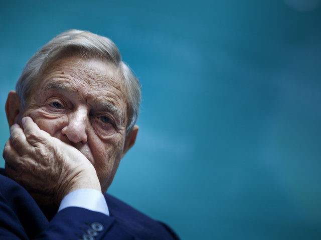 George Soros, Chairman of Soros Fund Management, listens during a seminar titled "Charting A New Growth Path for the Euro Zone" at the annual International Monetary Fund and World Bank meetings September 24, 2011 in Washington, DC. AFP PHOTO/Brendan SMIALOWSKI (Photo credit should read BRENDAN SMIALOWSKI/AFP/Getty Images)