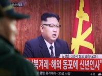 A South Korean man watches North Korean leader Kim Jong Un delivering his New Year's speech on a TV news program shown at the Seoul Railway Station in Seoul, South Korea, Sunday, Jan. 1, 2017. North Korea's development of banned long-range missiles is in 