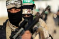 Palestinian militants from Hamas take part in a rally in Gaza City on November 25, 2016