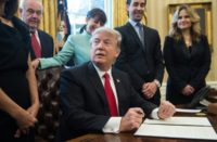 US President Donald Trump speaks before signing an executive order limiting regulation with small business leaders in the Oval Office at the White House on January 30, 2017