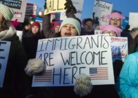 Demonstrators protest against US President Donald Trump and his administration's ban of travelers from seven countries by Executive Order, during a rally outside the US Supreme Court in Washington, DC, on January 30, 2017