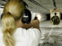 Jennifer Deasy shoots her Colt Government .380 caliber pistol at a target at Niagara Gun Range in North Tonawanda, N.Y., Thursday June 26, 2008. Americans can keep guns at home for self-defense, the Supreme Court ruled Thursday in the justices' first-ever pronouncement on the meaning of gun rights under the Second Amendment. (AP Photo/David Duprey)