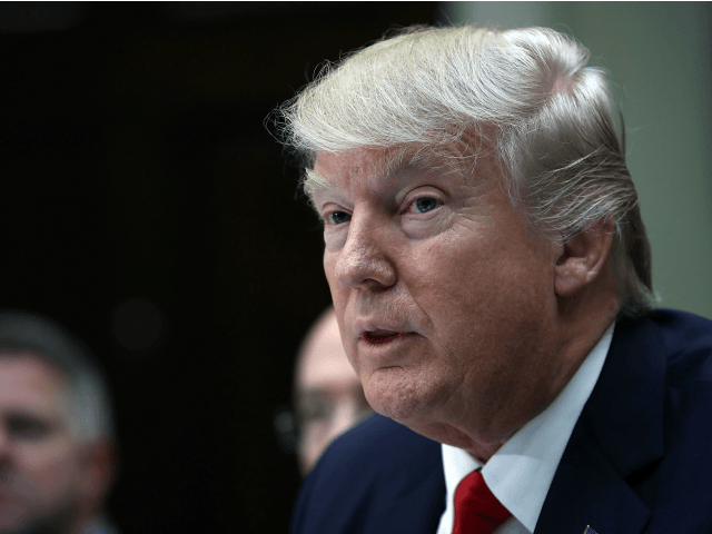 WASHINGTON, DC - FEBRUARY 02: (AFP OUT) U.S. President Donald Trump meets with executives and union representatives from the Harley Davidson company at the White House on February 2, 2017 in Washington, DC. At the end of the photo opportunity, Trump said 'nothing is off the table' in relation to current disagreements between the U.S. and Iran. (Photo by Win McNamee/Getty Images)