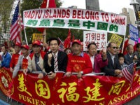 Demonstrators believing that the Diaoyu Islands belong to China, protest across the street from the United Nations, during the 67th United Nations General Assembly meeting, September 26, 2012 in New York. Taiwan will push ahead with plans to set up a national marine park near disputed islands in the East China Sea also claimed by Japan and China, a top official said Wednesday. Interior Minister Lee Hong-yuan made the remarks in parliament, one day after dozens of Taiwanese boats entered territorial waters around the disputed islands to press Taipei's claim. AFP PHOTO / DON EMMERT (Photo credit should read DON EMMERT/AFP/GettyImages)