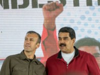 Venezuelan President Nicolas Maduro (R) and his vice-president Tareck El Aissami participate in a rally with workers of PDVSA state-owned oil company in Carcas January 31, 2017.