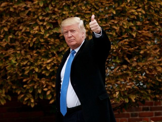 President-elect Donald Trump waves as he arrives at Trump International Golf Club for a day of meetings, November 20, 2016 in Bedminster Township, New Jersey. Trump and his transition team are in the process of filling cabinet and other high level positions for the new administration. (Photo by Drew Angerer/Getty Images)