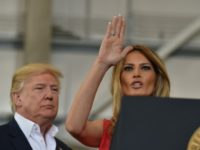 US President Donald Trump and First Lady Melania Trump arrive for a rally on February 18, 2017 in Melbourne, Florida