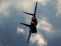 This Thursday, Dec. 29, 2016 photo shows an Israeli Air Force F-15 plane in flight during a graduation ceremony for new pilots in the Hatzerim air force base near the city of Beersheba, Israel. Anti-aircraft missiles were launched from Syria into Israeli-controlled territory early on Friday, following a series of Israeli airstrikes inside Syria, the Israeli military said. The military said its warplanes struck several targets in Syria and were back in Israeli-controlled airspace when several anti-aircraft missiles were launched from Syria toward the Israeli jets. (AP Photo/Ariel Schalit)