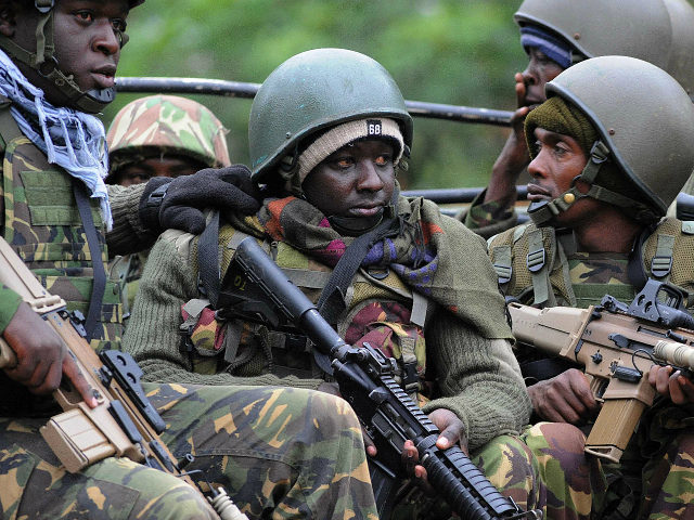 Kenya Defense Forces (KDF) arrive on September 22, 2013 at the Westgate mall in Nairobi. Kenyan troops were locked in a fierce firefight with Somali militants inside an upmarket Nairobi shopping mall on September 22 in a final push to end a siege that has left 43 dead and 200 wounded with an unknown number of hostages still being held. Somalia's Al Qaeda-inspired Shebab rebels said the carnage at the part Israeli-owned complex mall was in retaliation for Kenya's military intervention in Somalia, where African Union troops are battling the Islamists. AFP PHOTO / SIMON MAINA (Photo credit should read SIMON MAINA/AFP/Getty Images)