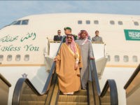 BEIJING, CHINA - MARCH 15: (----EDITORIAL USE ONLY MANDATORY CREDIT - 'BANDAR ALGALOUD / SAUDI KINGDOM COUNCIL / HANDOUT' - NO MARKETING NO ADVERTISING CAMPAIGNS - DISTRIBUTED AS A SERVICE TO CLIENTS----) Saudi Arabia's King Salman bin Abdulaziz Al Saud (L) is being welcomed by Yang Jiechi (not seen), State Councilor of the People's Republic of China (not seen) with an official welcoming ceremony at the airport in Beijing, China on March 15, 2017. (Photo by Bandar Algaloud / Saudi Kingdom Council / Handout/Anadolu Agency/Getty Images)