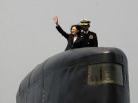 Taiwan President Tsai Ing-wen waves from a Duch-made Sea Tiger submarine at the Tsoying navy base in Kaohsiung, southern Taiwan on March 21, 2017. Taiwan formally launched an ambitious project to build its own submarines as the island faces growing military threats from China as relations deteriorate. / AFP PHOTO / SAM YEH (Photo credit should read SAM YEH/AFP/Getty Images)