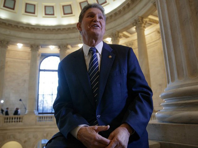 Sen. Joe Manchin, D-W.Va., speaks during a television news interview on Capitol Hill in Washington, Wednesday, Feb. 1, 2017, on President Donald Trump's choice of Neil Gorsuch to fill the Supreme Court vacancy left by Antonin Scalia's death. Manchin said he had little sympathy for fellow Senate Democrats feeling pressure to support Trump's nominee because they're running for re-election in 2018 in states that Trump won. Manchin is among those up for re-election I n 2018. (AP Photo/J. Scott Applewhite)
