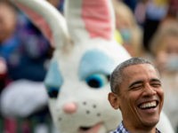 President Barack Obama, joined by the Easter Bunny, greets members of the audience on the South Lawn at the White House Easter Egg Roll at the White House in Washington, Monday, March 28, 2016. Thousands of children gathered at the White House for the annual Easter Egg Roll which features live music, sports courts, cooking stations, storytelling, and Easter egg rolling. (AP Photo/Andrew Harnik)