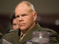 General Robert Neller listens during the Senate Armed Services Committee on Information Surrounding the Marines United Website at the Dirksen Senate Office Building on March 14, 2017