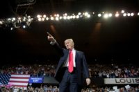 US President Donald Trump arrives for a 'Make America Great Again' rally at the Kentucky Exposition Center in Louisville, Kentucky, March 20, 2017