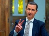 Syria's President Bashar al-Assad speaks during an interview with AFP news agency in Damascus, Syria in this handout picture provided by SANA on April 13, 2017. SANA/Handout via REUTERS