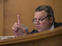 Senate Banking Committee member Sen. Jon Tester, D-Mont., questions Wells Fargo Chief Executive Officer John Stumpf, on Capitol Hill in Washington, Tuesday, Sept. 20, 2016, during the committee's hearing. Stumpf was called before the committee for betraying customers' trust in a scandal over allegations that employees opened millions of unauthorized accounts to meet aggressive sales targets. (AP Photo/Susan Walsh)