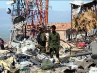 Fighters from the Kurdish People's Protection Units (YPG) and Kurdish police, known as the Asayish, visit the site of Turkish airstrikes near northeastern Syrian Kurdish town of Derik, known as al-Malikiyah in Arabic, on April 25, 2017. Turkish warplanes killed more than 20 Kurdish fighters in strikes in Syria and Iraq, where the Kurds are key players in the battle against the Islamic State group. The bombardment near the city of Al-Malikiyah in northeastern Syria saw Turkish planes carry out 'dozens of simultaneous air strikes' on YPG positions overnight, including a media centre, the Syrian Observatory for Human Rights said. / AFP PHOTO / DELIL SOULEIMAN (Photo credit should read DELIL SOULEIMAN/AFP/Getty Images)