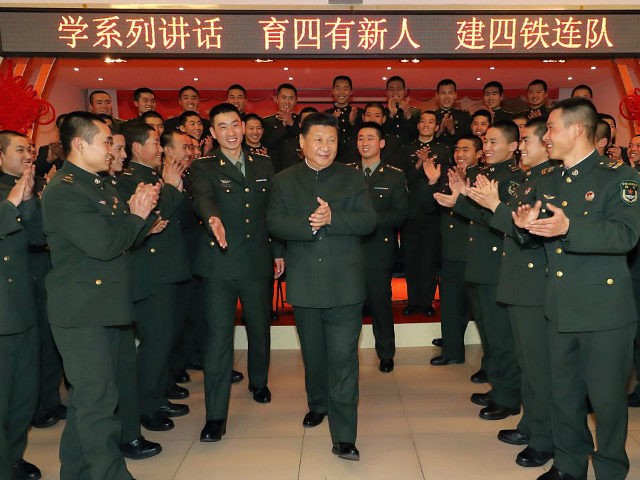 ZHANGJIAKOU, Jan. 25, 2017 -- Chinese President Xi Jinping (C), also general secretary of the Communist Party of China Central Committee and chairman of the Central Military Commission, visits soldiers and officers of the 65th Army Group in Zhangjiakou City, north China's Hebei Province, Jan. 23, 2017. Xi visited the 65th Army Group stationed in northern China's Hebei Province on Monday. (Xinhua/Li Gang via Getty Images)