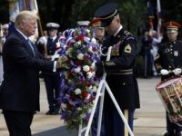 President Donald Trump participates in a wreath laying ceremony at Arlington National Cemetery, Monday, May 29, 2017, in Arlington, Va. (AP Photo/Evan Vucci)
