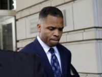 FILE - In this Aug. 14, 2013, file photo, former Illinois Rep. Jesse Jackson Jr., leaves federal court in Washington after being sentenced to 2 1/2 years in prison for misusing $750,000 in campaign funds. Jackson Jr. will be released from a federal prison on Thursday, March 26, 2015, and will serve out the remainder of his term in a Washington, D.C., halfway house, former U.S. Rep. Patrick Kennedy told The Associated Press after visiting Jackson behind bars. (AP Photo/Susan Walsh, File)
