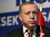 Turkey's President Recep Tayyip Erdogan addresses a business meeting in Istanbul, Thursday, May 18, 2017. Turkey has told the United States it will not join in any military operations that include Kurdish fighters in Syria, Erdogan said Thursday, while vowing to strike the U.S.-backed Kurds if they threaten Turkey's security.(Presidency Press Service, Pool photo via AP)