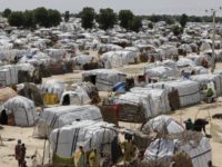 FILE- This Sunday Aug. 28, 2016 file photo shows a general view of one of the biggest camp for people displaced by Islamist Extremist in Maiduguri, Nigeria. Camps for thousands of people displaced by Boko Haram will have to stay open beyond the end of this month as Nigeria's military continues to fight the extremists in so-called liberated areas, officials say. The governor of the northern state of Borno, Kashim Shettima, told reporters on Tuesday, May 16, 2017 that it is not yet safe to return people to their homes in many places across the region. ( AP Photo/Sunday Alamba, File)