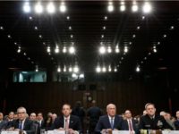 From left: Acting FBI Director Andrew McCabe, Deputy Attorney General Rod Rosenstein, National Intelligence Director Dan Coats and National Security Agency Director Adm. Michael Rogers are seated during a Senate Intelligence Committee hearing on Capitol Hill Wednesday. (ALEX BRANDON/AP)