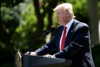 US President Donald Trump said the United States would abandon the Paris climate deal -- but was open to negotiating a new one
