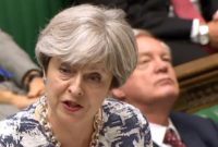 British Prime Minister Theresa May was accused by opposition lawmakers of using Europeans as "bargaining chips" by refusing to guarantee their rights until a reciprocal deal was struck for around one million Britons living elsewhere in the EU